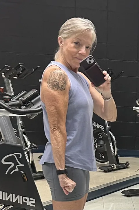 Donna Sumrall smiling in the gym
